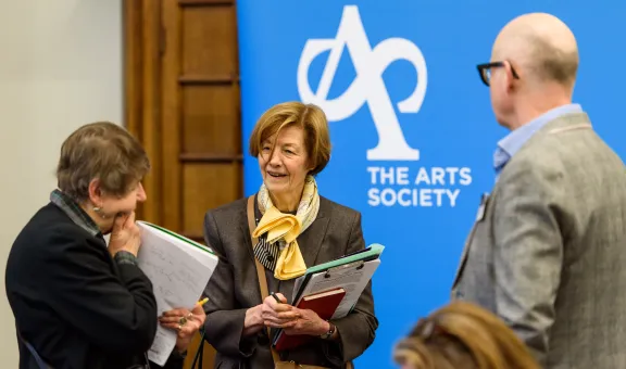 A group of three Arts Society members in conversation Directory Day 2026 