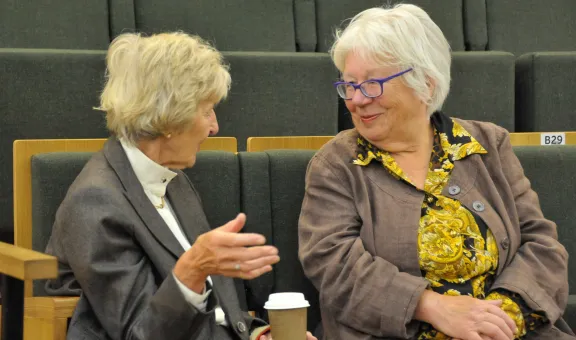 Two Arts Society members in conversation