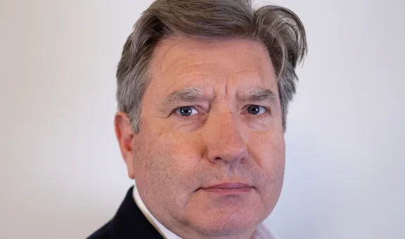 Portrait Head & Shoulders Photograph of Chief Executive Ian Arnold